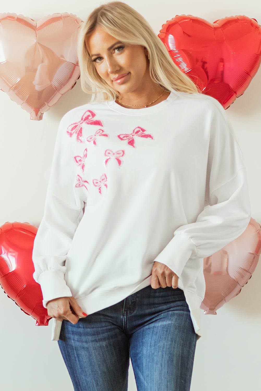 Sweat-shirt surdimensionné a paillettes et nœud papillon