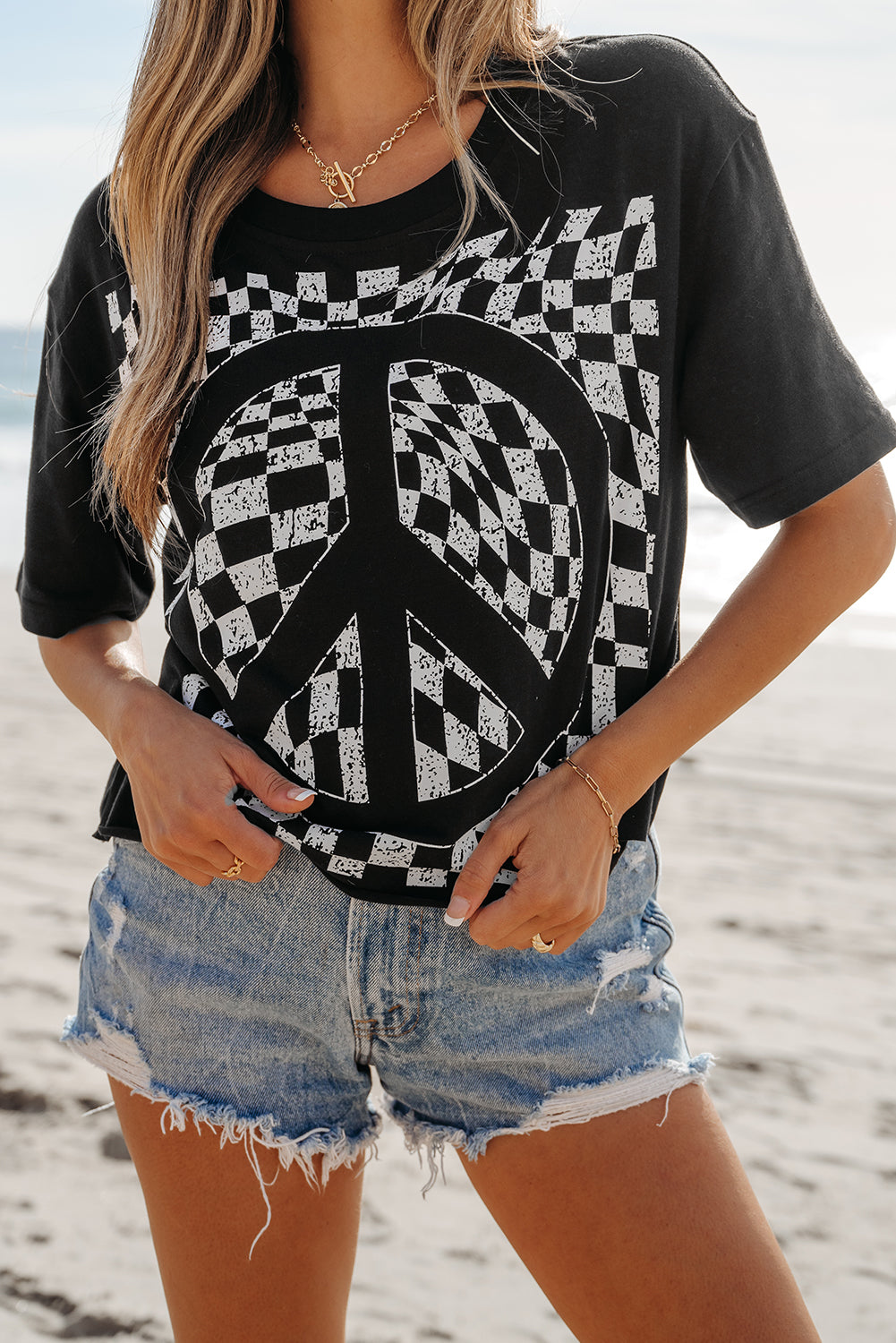 T-shirt col rond imprimé signe de paix en damier